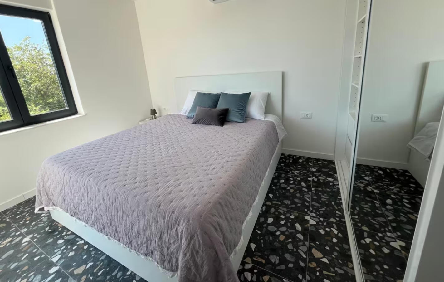 Fireplace-equipped outdoor kitchen