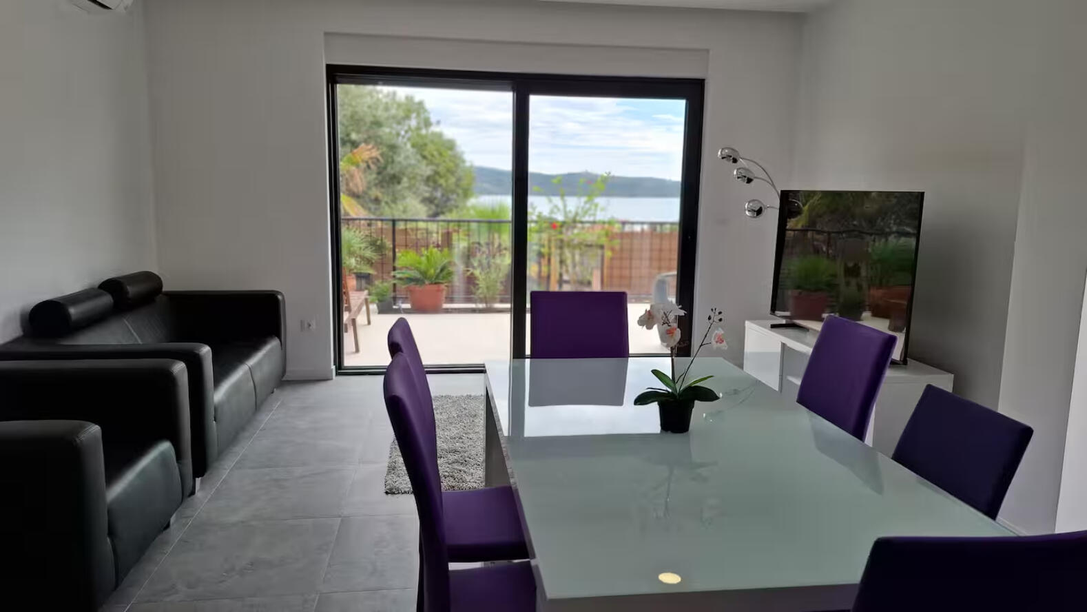 Fireplace-equipped outdoor kitchen